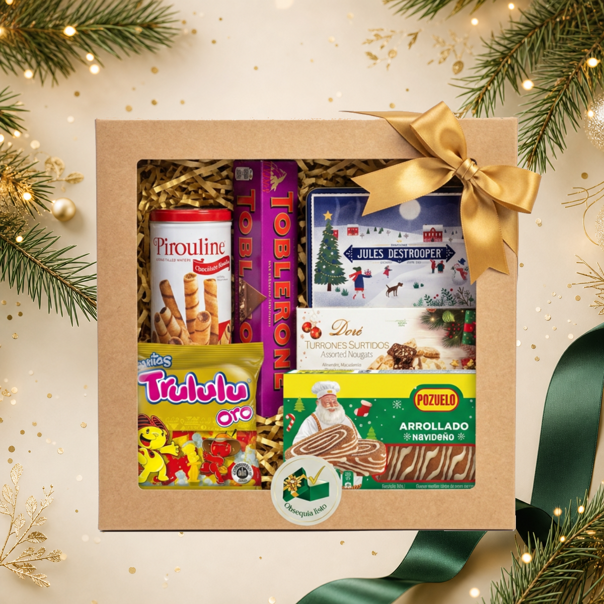 Dulces Festividades en caja de cartón con lazo dorado